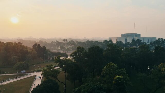 Golden Sunrise Drone Shot of Chondrima Uddan and Bangladesh Parliament, Dhaka Cityscape