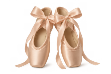 Ballet pointe shoes in delicate pink satin with elegant ribbons tied, symbolizing grace, art, and classical dancing