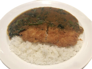 Isolated Japanese curry rice with spinach and fried pork.