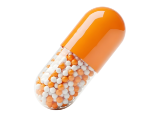 Colorful orange and white beads inside a transparent medical capsule on transparent background