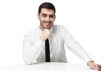 Young businessman wearing formal shirt with tie leaning on white table, pressing fist to chin, looking interested in conversation
