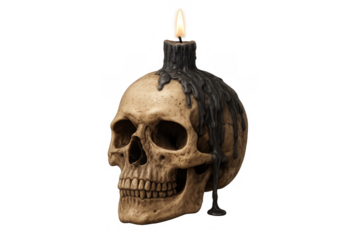 Human skull with burning black candle on top offering spooky gothic atmosphere and symbolizing memento mori