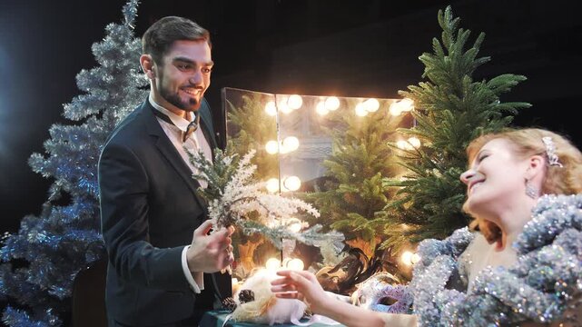 Backstage holiday dressing room with performers. Christmas surprises