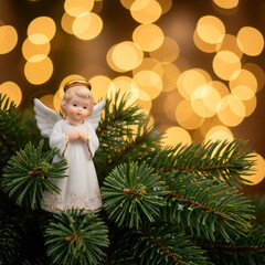 angel with christmas tree and stars