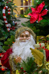 A nostalgic Santa Claus figure in a store window at Christmas time in Haifa, Israel.
