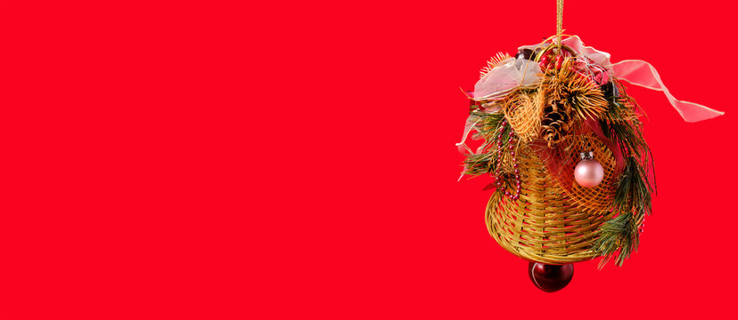 Christmas card with a bell on a red background, space for text - Powered by Adobe