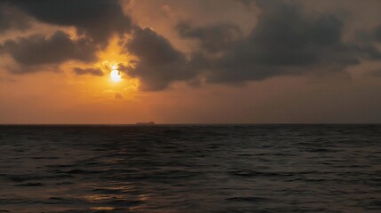 Fototapeta premium Sunset over the sea at dusk