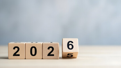 Wooden blocks forming the year 2026, symbolizing the transition to the next year, future planning, changes, goals, and new strategic beginnings.