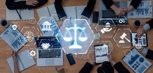 A dynamic business meeting showcases unique technology integration for legal and financial discussions, with devices and charts fostering collaboration and insight. Trope