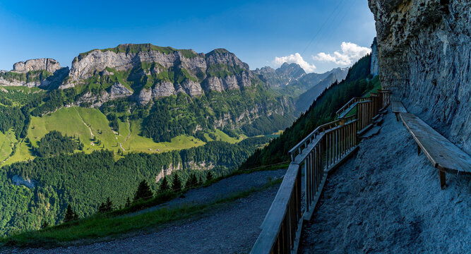 Breathtaking Alpine Vista Serene Hike Along Aescher Cliff Edge in Appenzell Alps Switzerland