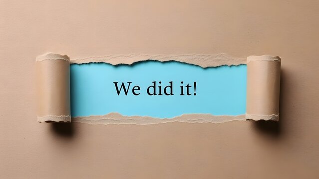 Triumphant announcement of success revealed through torn beige paper revealing a bright blue background with the celebratory phrase we did it