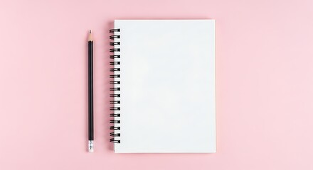 Open spiral notebook with blank white pages and a black pencil neatly arranged on a soft pink background, perfect for notes, ideas, or creative work