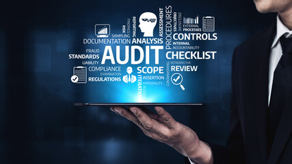 Businessman Presenting Digital Tablet with Audit Concept and Keywords on Blue Background, Representing Analysis, Compliance, Procedures, and Review. Tessel.