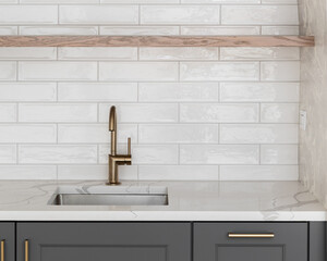 A modern kitchen sink detail with a brass faucet against a white subway tile backsplash, floating...