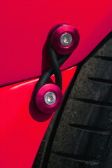 Red Car Bumper Retainer Clips with Elastic Strap Close-Up