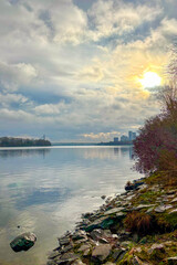 Walking along the calm embankment of the Dnypro in Obolon reveals soft autumn light and a peaceful riverside mood in Kyiv, Ukraine.