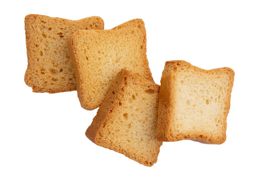 whole wheat mini toasts, toasted slices of bread or rusks isolated on white background, top view