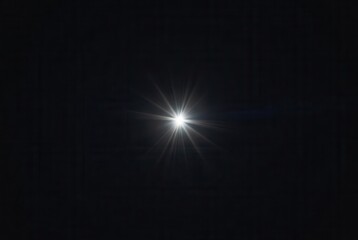 Fototapeta premium Glow of a bright starburst light effect with brilliant rays and subtle lens flare