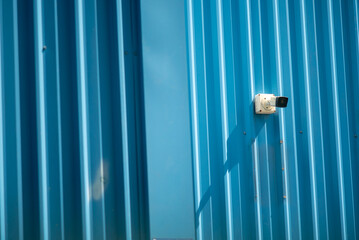 Obraz premium Blue Wall with Security Camera Detail
