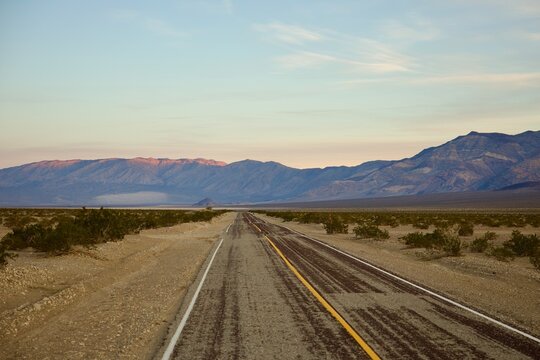 desert mountain road at sunrise - Powered by Adobe