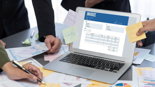 Analyst team use sticky note for creative and analytic brainstorm for business idea with BI data dashboard on laptop screen. Analysis financial data visualization tech for marketing strategy. Prodigy - Powered by Adobe