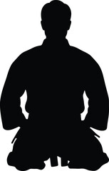 Black silhouette of a martial artist kneeling in a respectful seiza posture during training or meditation