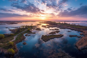 Panoramic view of a vibrant sunset over the tranquil swamps showcasing reflections and serene landscapes