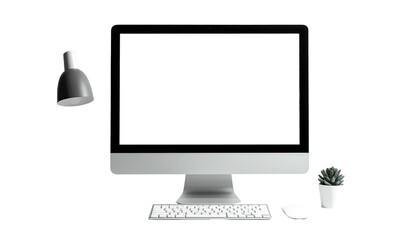 Fototapeta premium A desktop computer with a blank screen, a lamp, mouse, keyboard, and small potted plant