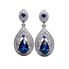 Elegant pair of teardrop sapphire and diamond dangle earrings set in white gold or platinum against a black background.