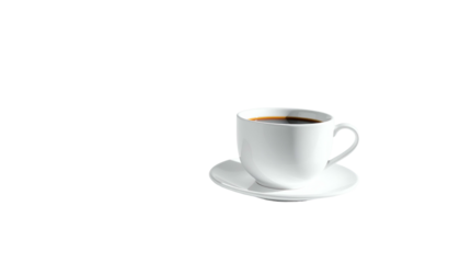A white ceramic coffee cup, filled, sits on a saucer against a black backdrop, lit well