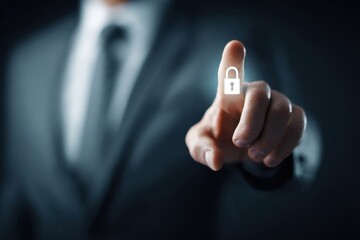 Businessman clicking data protection button to enhance security measures in a modern office setting