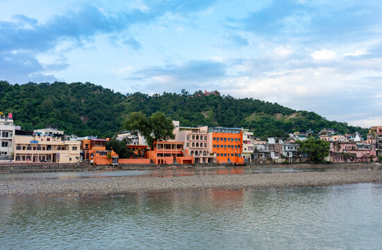 Buildings and Ashrams on the Banks of River Ganga with Mansa Devi Hill Backdrop in Haridwar