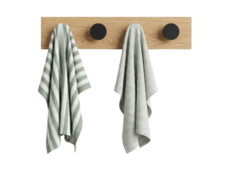 minimalist kitchen hooks with striped dish towels isolated on black background