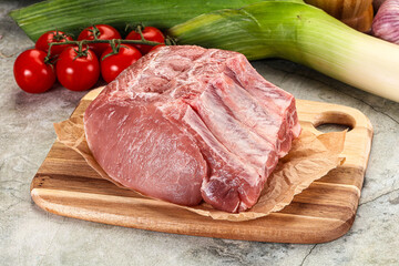Raw pork loin cut with bone