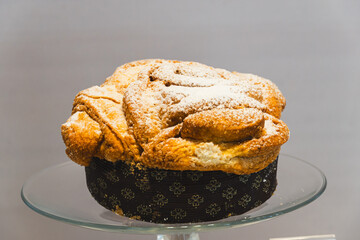 A delicious slice of typical Mantuan cake, served on a glass plate.