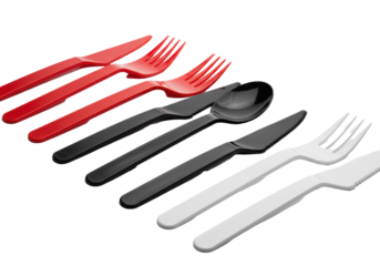 Sets of glossy red, black, and white disposable plastic cutlery in parallel on a transparent background with crisp reflections. Minimalist product design concept