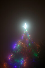 Ethereal Christmas Tree in Mist with Glowing christmas Star