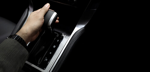 Car gear. Close up of modern car automatic gear selector or electronic shifter. Premium interior design EV car gears driving control. auto transmission modes. Automotive technology in motion driving.