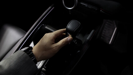 Car gear. Close up of modern car automatic gear selector or electronic shifter. Premium interior design EV car gears driving control. auto transmission modes. Automotive technology in motion driving.