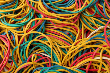 Many colorful rubber bands as background, closeup