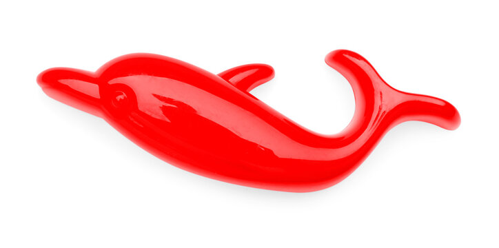 Plastic dolphin shaped mold isolated on white, top view. Children's beach toy