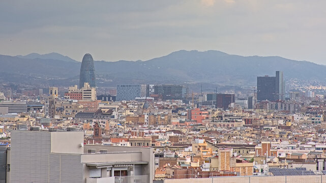 Aerial view on the city of Barcelona, and Tibidabo mountains in the background. Catalonia, Spain 