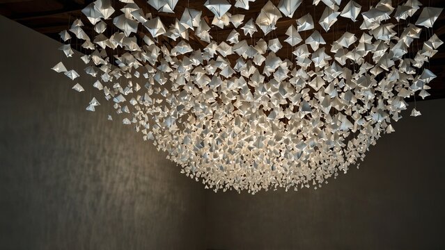 Artistic visualization of room with chandel made of paper cranes - Generative AI