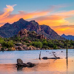 Sunset over a desert lake with mountains