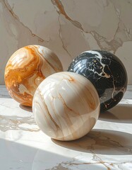 Three polished spheres on marble