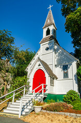 White church with bright red door