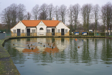 Fototapeta premium Building beside a boat pond