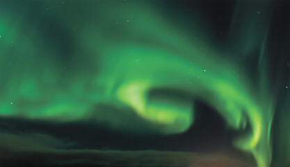 Vast emerald aurora curling into a luminous spiral above the dark polar horizon, forming a glowing...