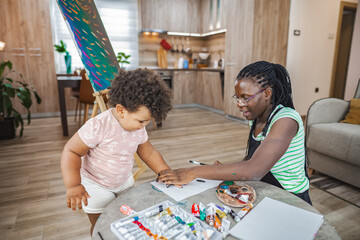 Cozy indoor painting with child in living room