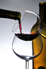 Wine Pour Stacked Glasses and Bottle